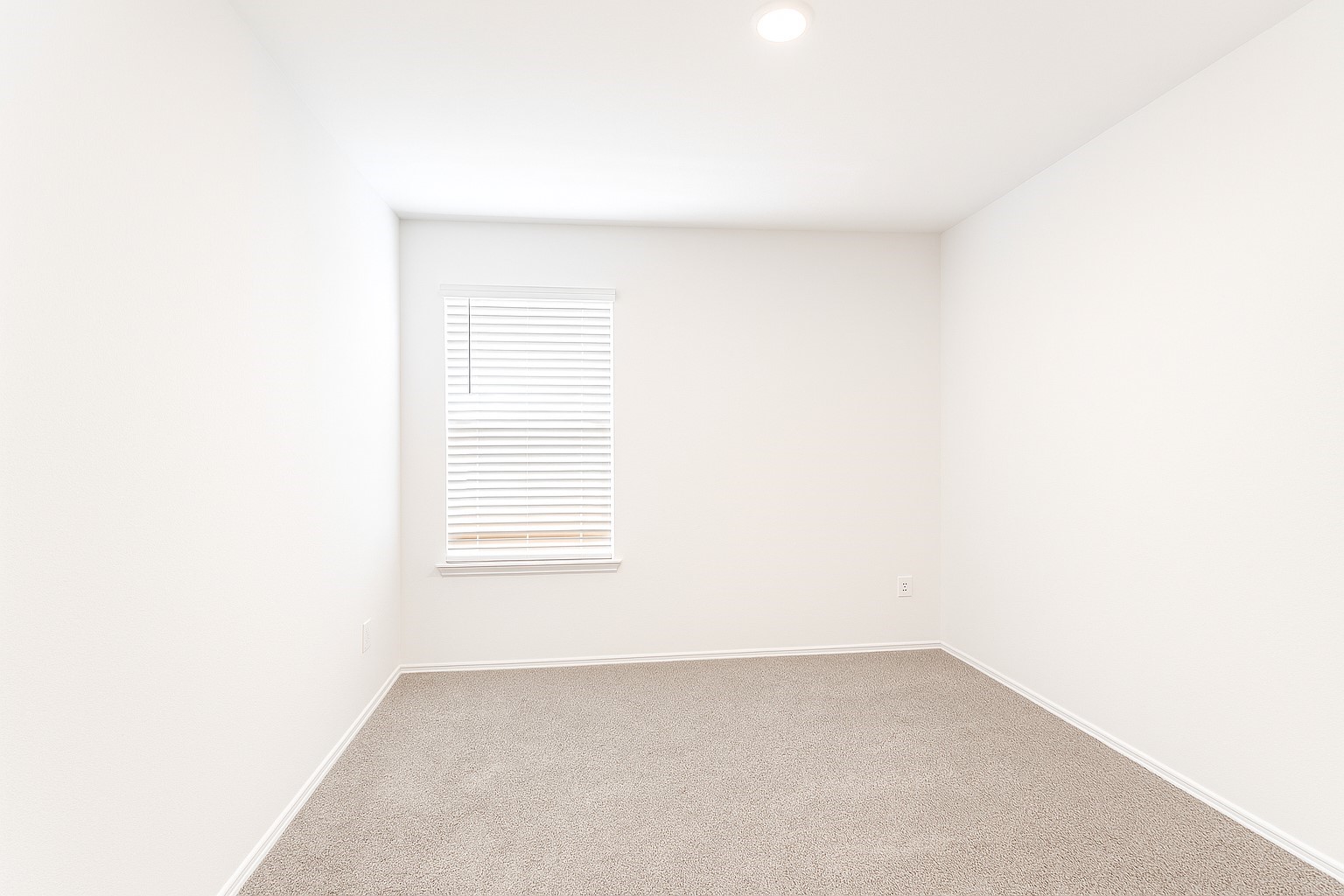 5611 Simcrest Grove Drive Spring, TX 77373 - Photo 16 of 18 a view of a room that has a window in it
