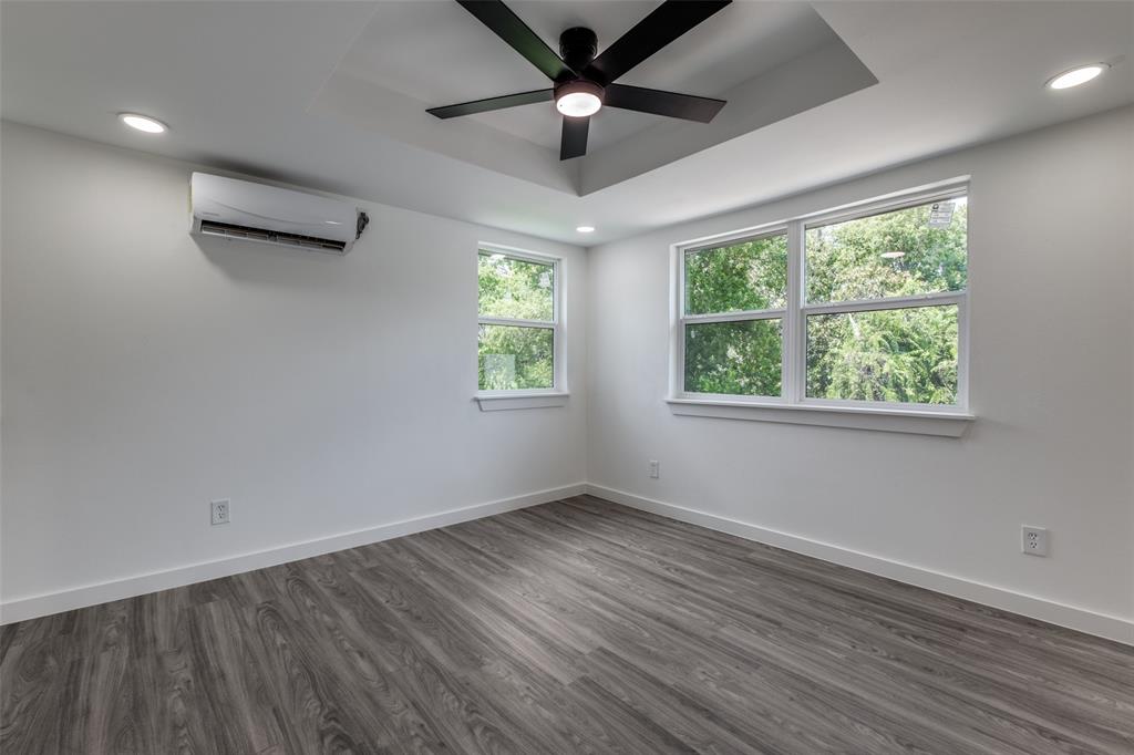 11341 Gatewood Place Dallas, TX 75218 - Photo 20 of 29 wooden floor in an empty room with a window