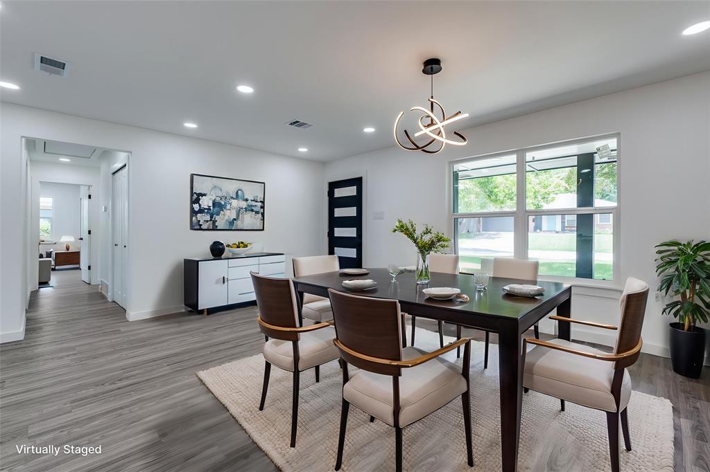 11341 Gatewood Place Dallas, TX 75218 - Photo 4 of 29 a view of a dining room with furniture window and wooden floor