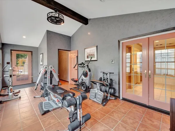 a view of a room with gym equipment