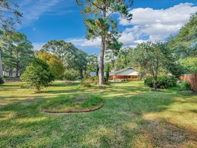 a view of a golf course with a garden