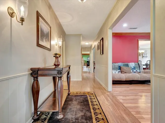 a view of living room and kitchen with furniture