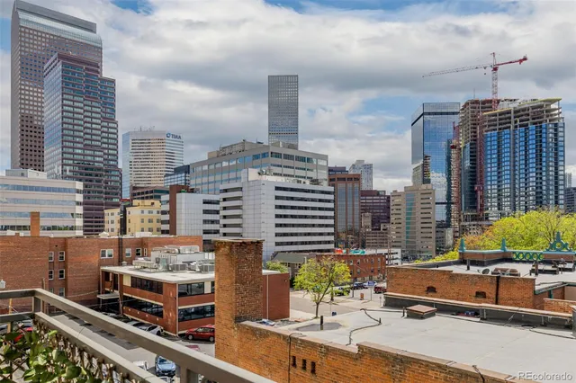 a city view with tall buildings