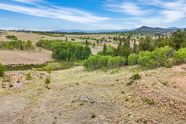 a view of a lake with a beach
