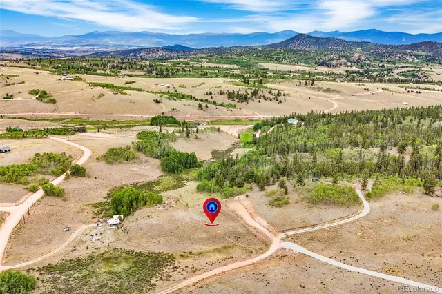 a view of an ocean and a mountain