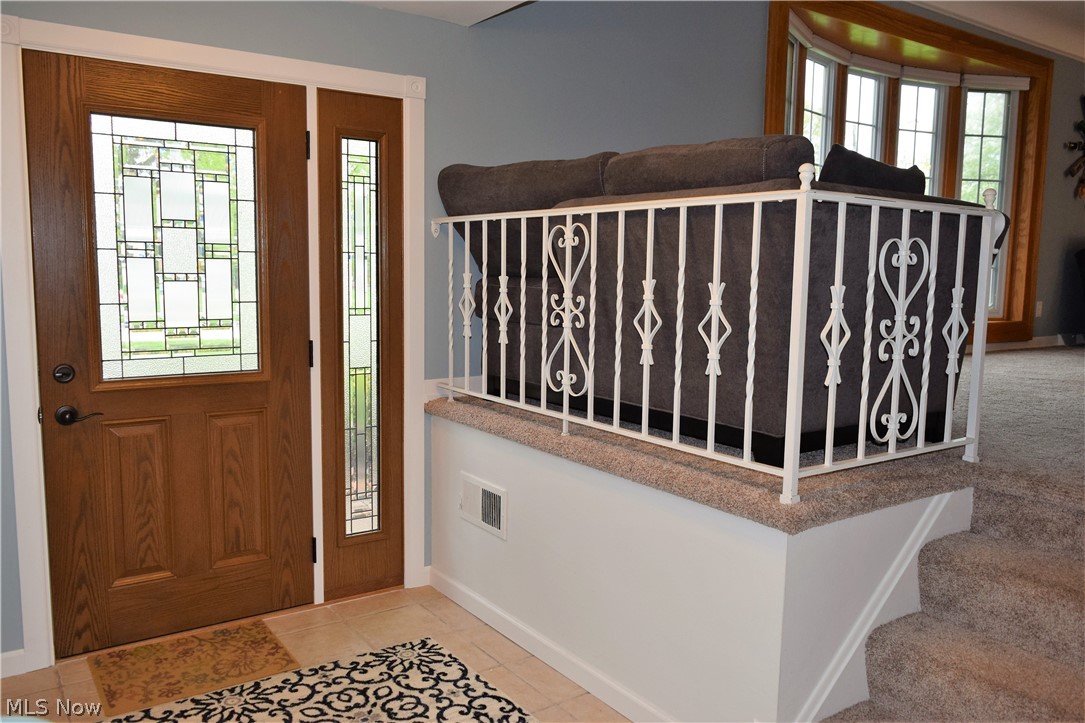 6510 Annandale Road Cleveland, OH 44124 - Photo 8 of 21 Beautiful newer front door (2017) and large entrance for guests.