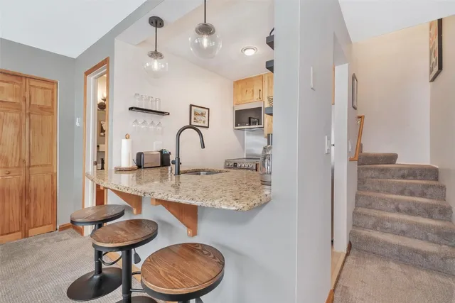 a view of a balcony with furniture