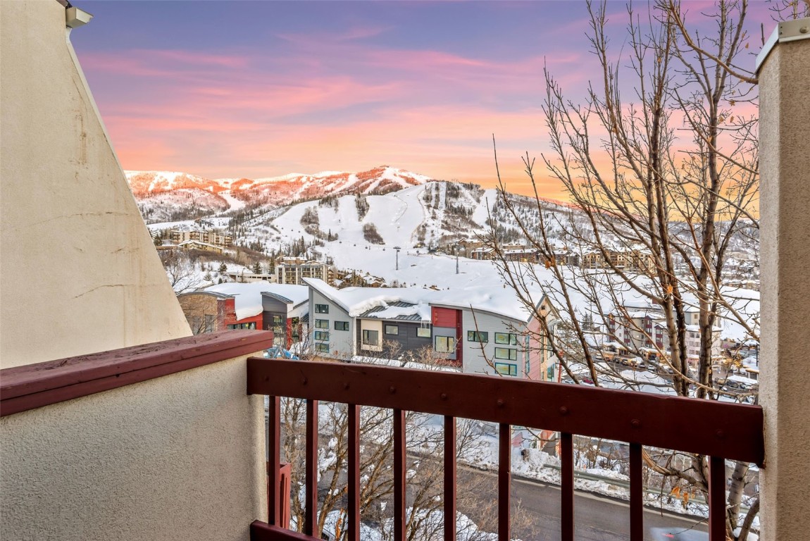 1800 Burgess Creek Road, Unit 205 Steamboat Springs, CO 80487 - Photo 30 of 37 a view of a city from a balcony