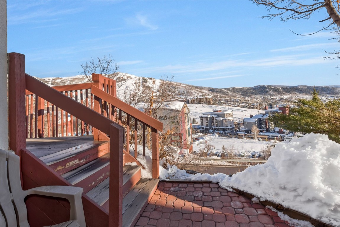 1800 Burgess Creek Road, Unit 205 Steamboat Springs, CO 80487 - Photo 33 of 37 a view of a balcony with an outdoor space