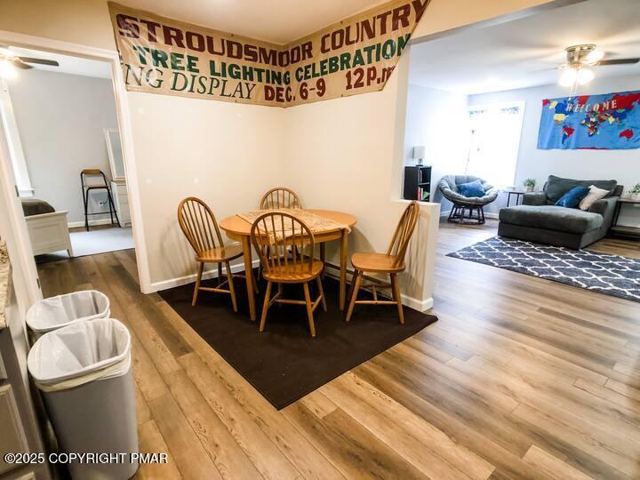 36 Main Street Delaware Water Gap, PA 18327 - Photo 12 of 37 a view of a dining room with furniture and wooden floor