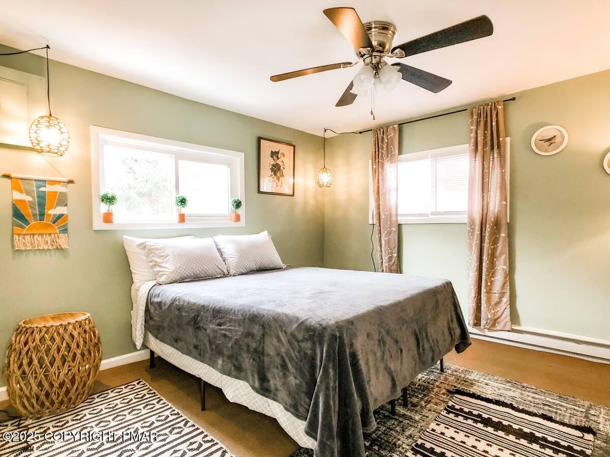 36 Main Street Delaware Water Gap, PA 18327 - Photo 21 of 37 a bedroom with a bed and window