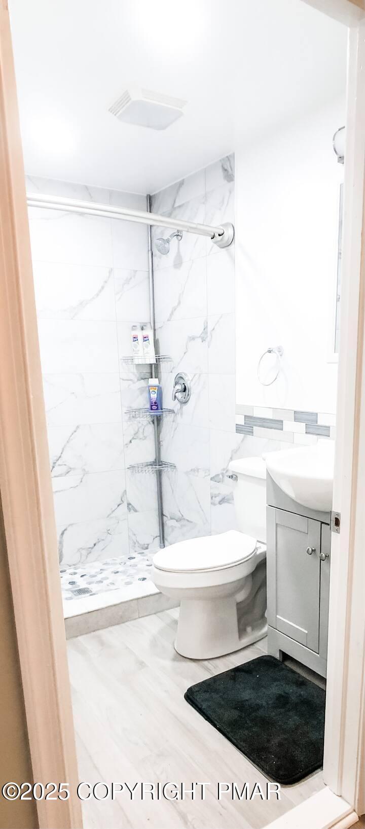 36 Main Street Delaware Water Gap, PA 18327 - Photo 23 of 37 a bathroom with a sink a toilet and shower