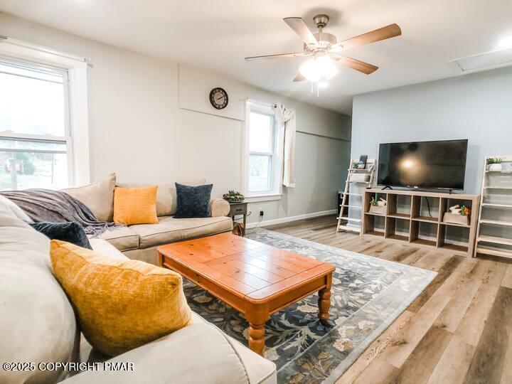 36 Main Street Delaware Water Gap, PA 18327 - Photo 25 of 37 a living room with furniture and a flat screen tv