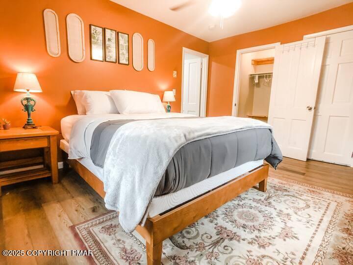 36 Main Street Delaware Water Gap, PA 18327 - Photo 27 of 37 a bed sitting in a bedroom next to a window