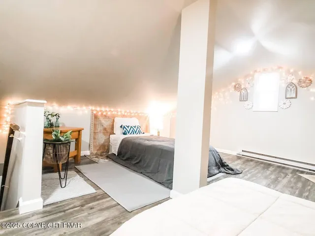 a living room with a couch and a rug