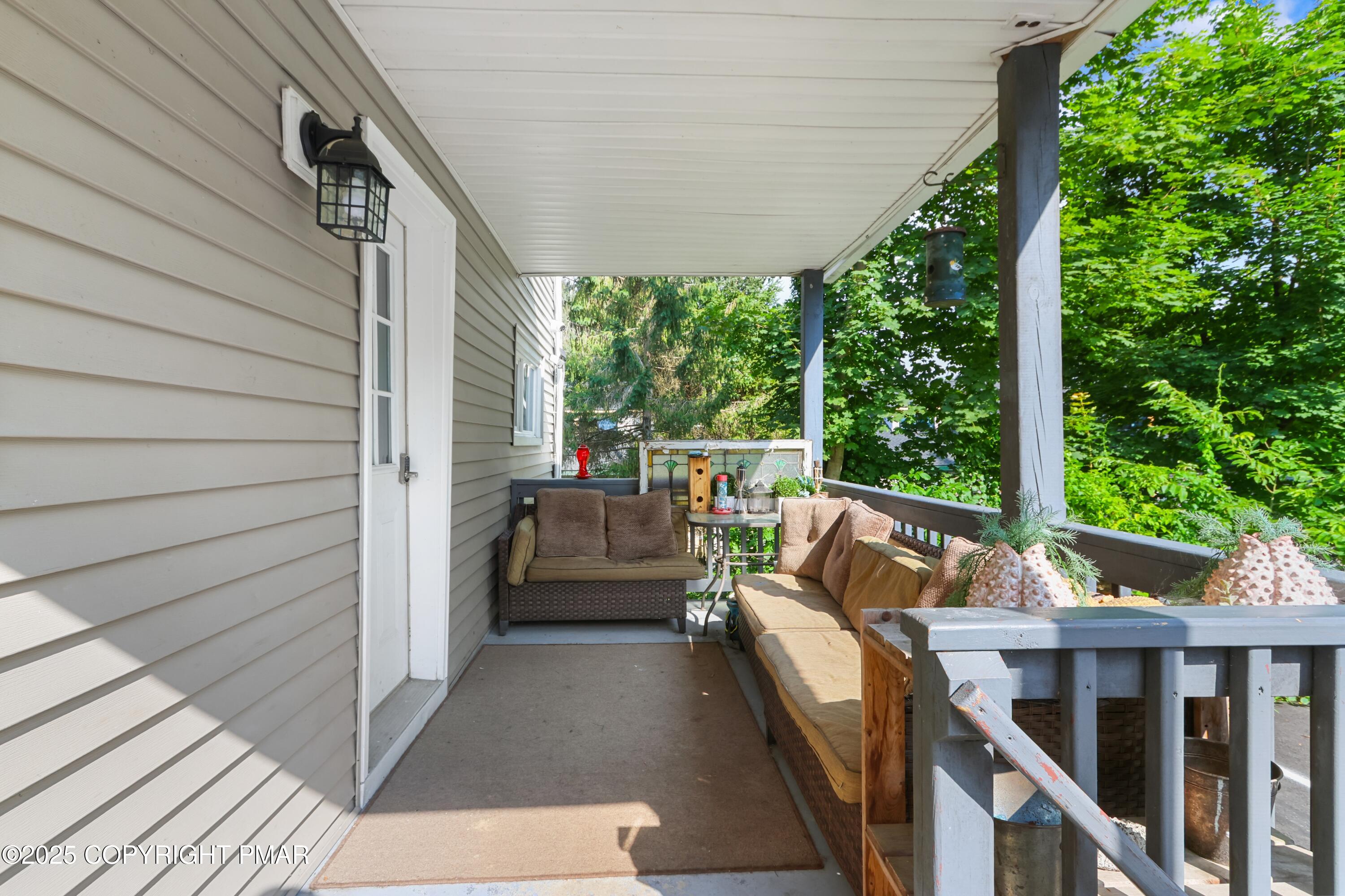 36 Main Street Delaware Water Gap, PA 18327 - Photo 33 of 37 a view of deck with furniture and garden