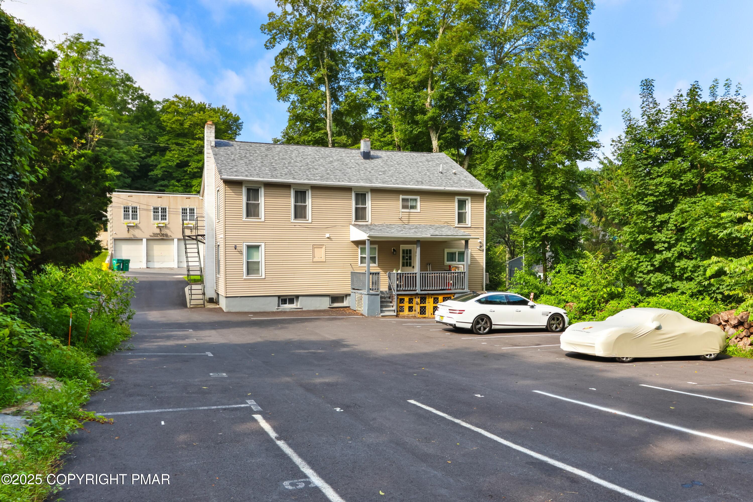36 Main Street Delaware Water Gap, PA 18327 - Photo 6 of 37 a view of a car parked in front of a house
