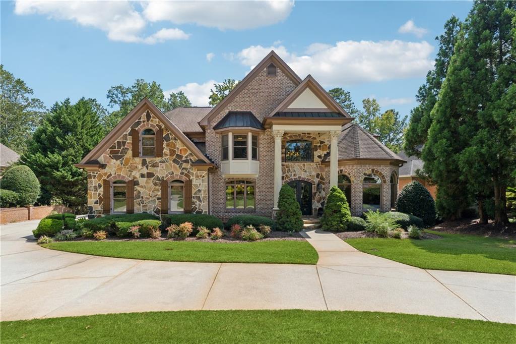 6935 Wakehurst Place Cumming, GA 30040 - Photo 2 of 92