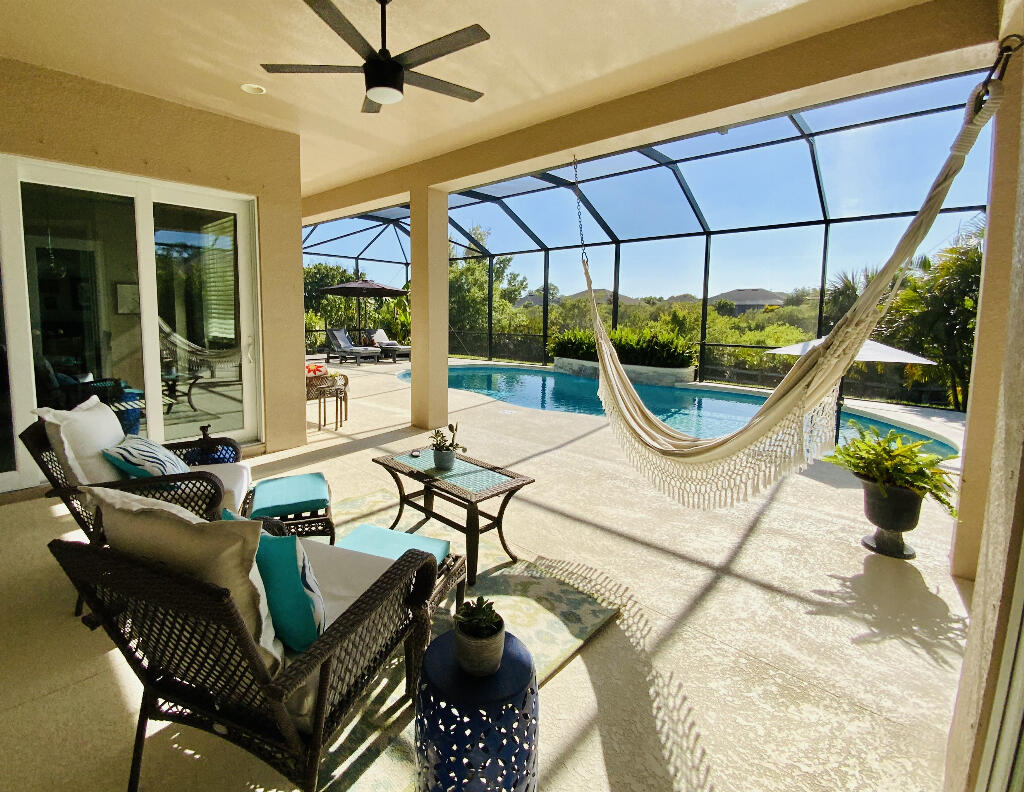 4644 Capri Lane Melbourne, FL 32935 - Photo 16 of 43 a view of a swimming pool with lounge chair