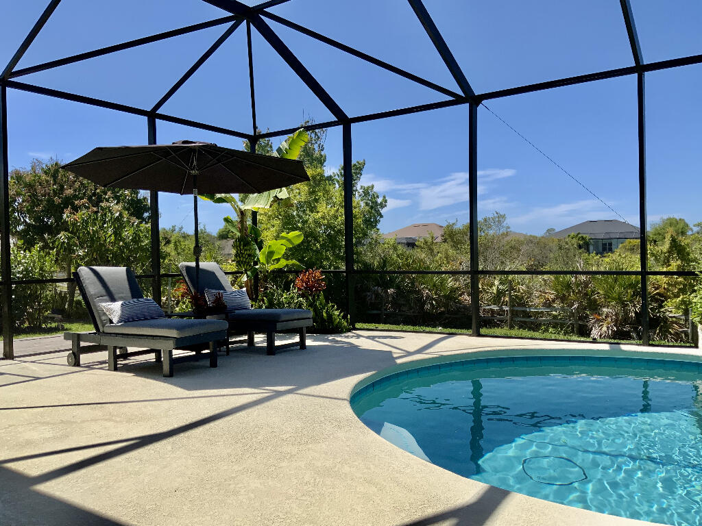 4644 Capri Lane Melbourne, FL 32935 - Photo 17 of 43 a view of sitting area with furniture and yard