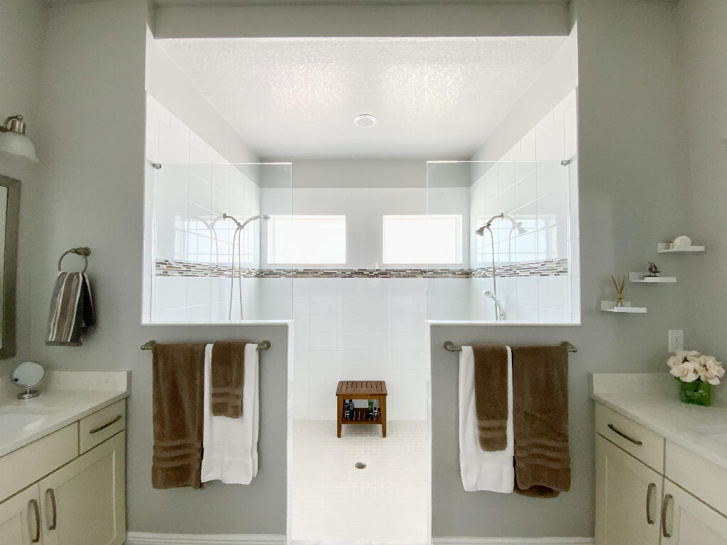 4644 Capri Lane Melbourne, FL 32935 - Photo 22 of 43 a kitchen with a sink and cabinets