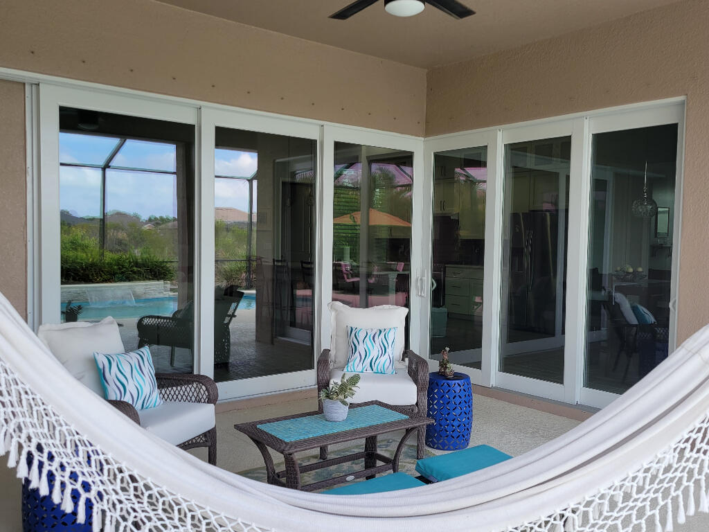 4644 Capri Lane Melbourne, FL 32935 - Photo 34 of 43 a dining room with table and chairs