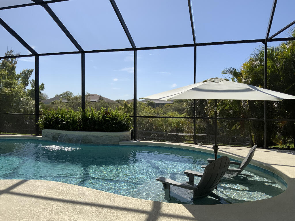 4644 Capri Lane Melbourne, FL 32935 - Photo 35 of 43 a backyard of a house with lots of green space