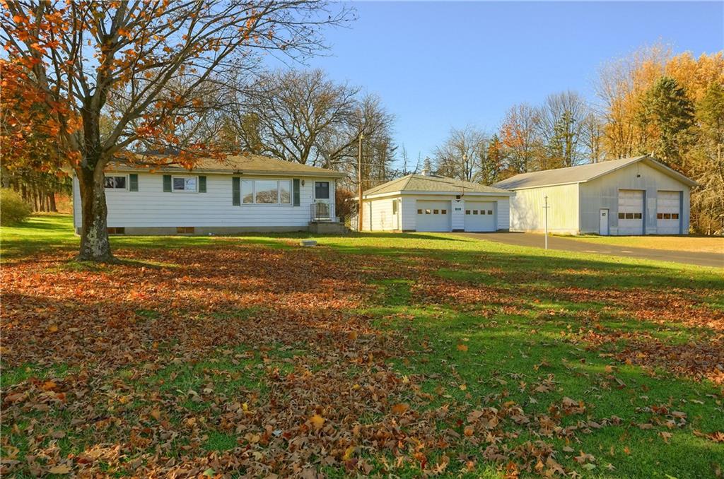 335 McCaslin Road New Castle, PA 16101 - Photo 1 of 31 a front view of a house with a yard