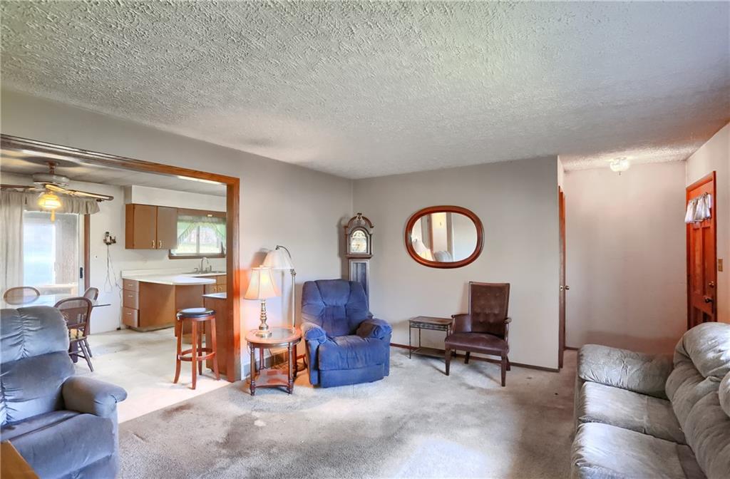335 McCaslin Road New Castle, PA 16101 - Photo 16 of 31 a living room with furniture and a large window