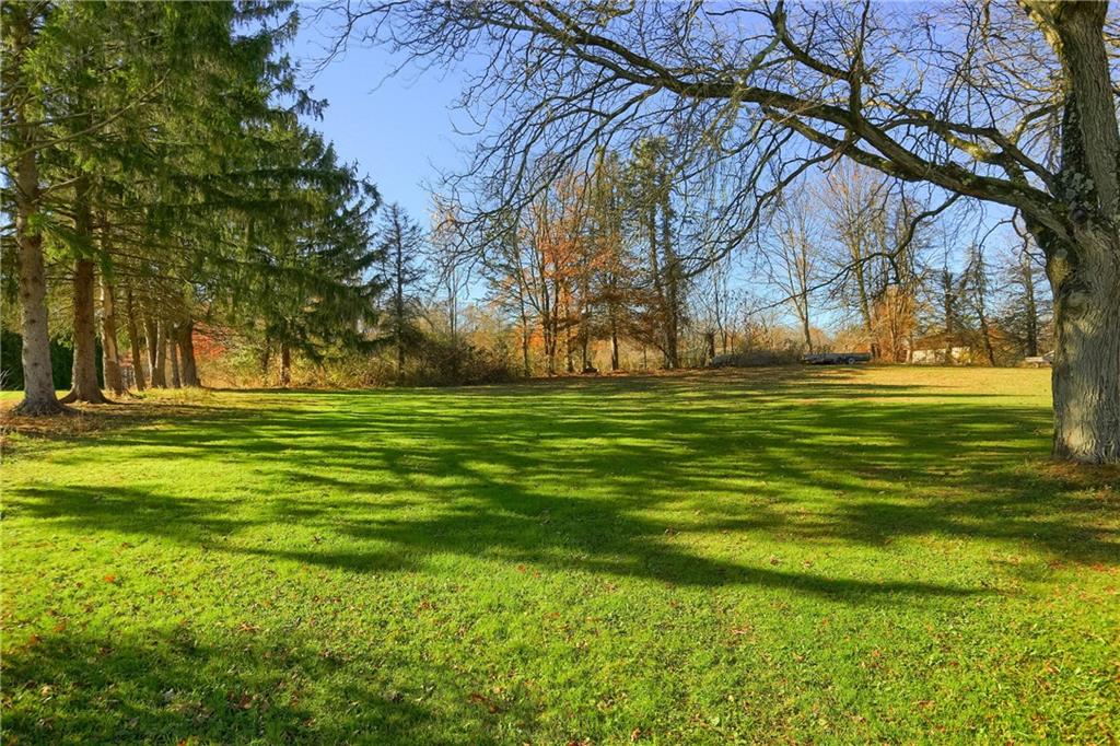 335 McCaslin Road New Castle, PA 16101 - Photo 28 of 31 a backyard of apartments with large trees