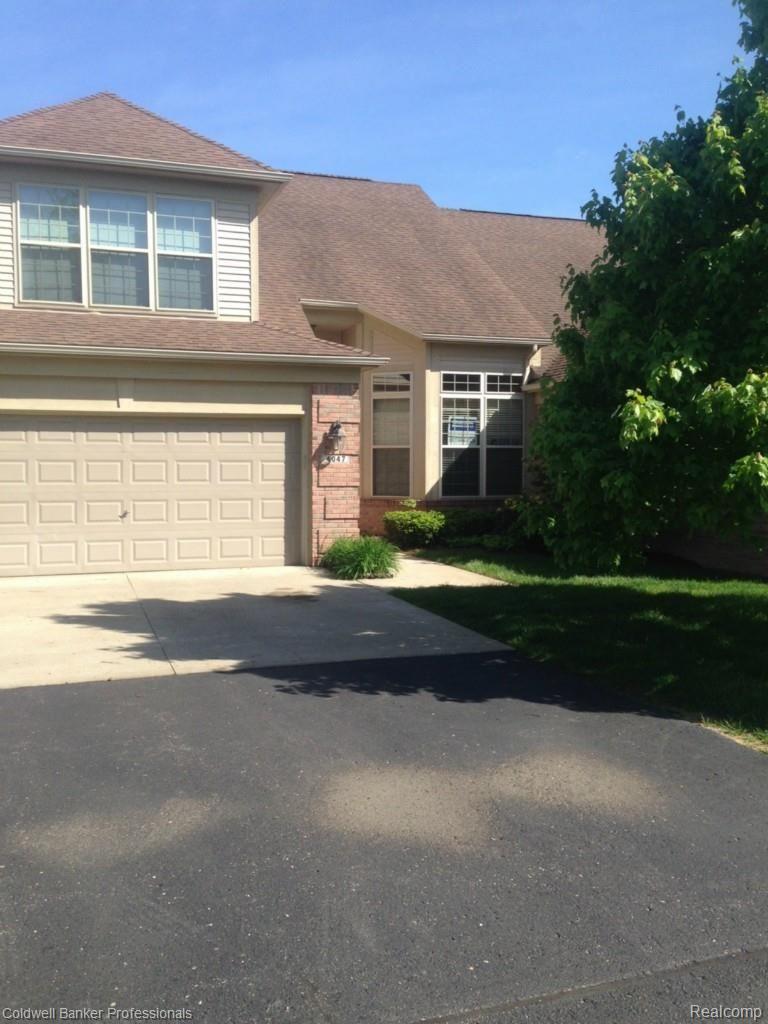 4047 Pne Rdg Drive, Unit 37 Dryden, MI 48428 - Photo 1 of 18 4047 Pine Ridge front spring.jpg