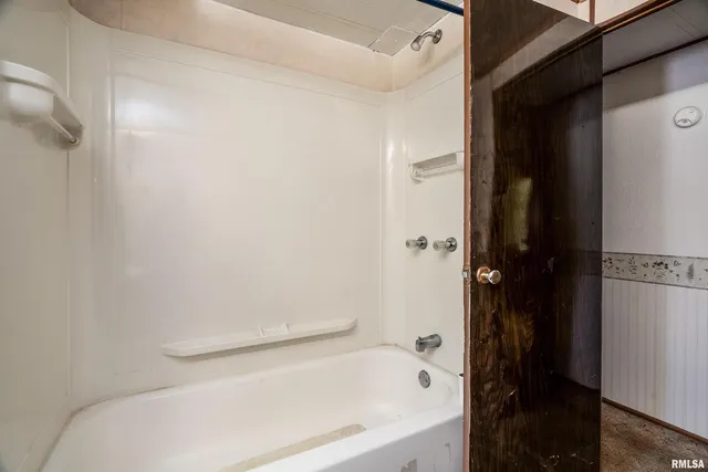 a bathroom with a bathtub