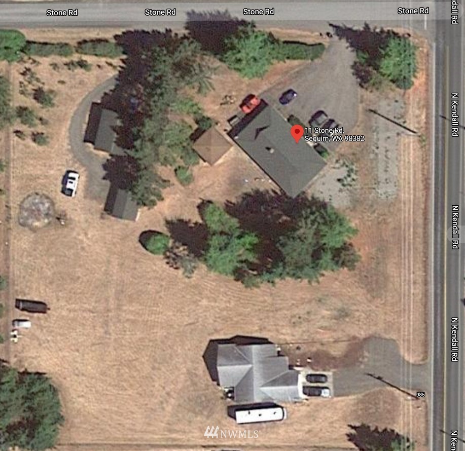11 Stone Road Sequim, WA 98382 - Photo 2 of 21 an aerial view of a house with a yard