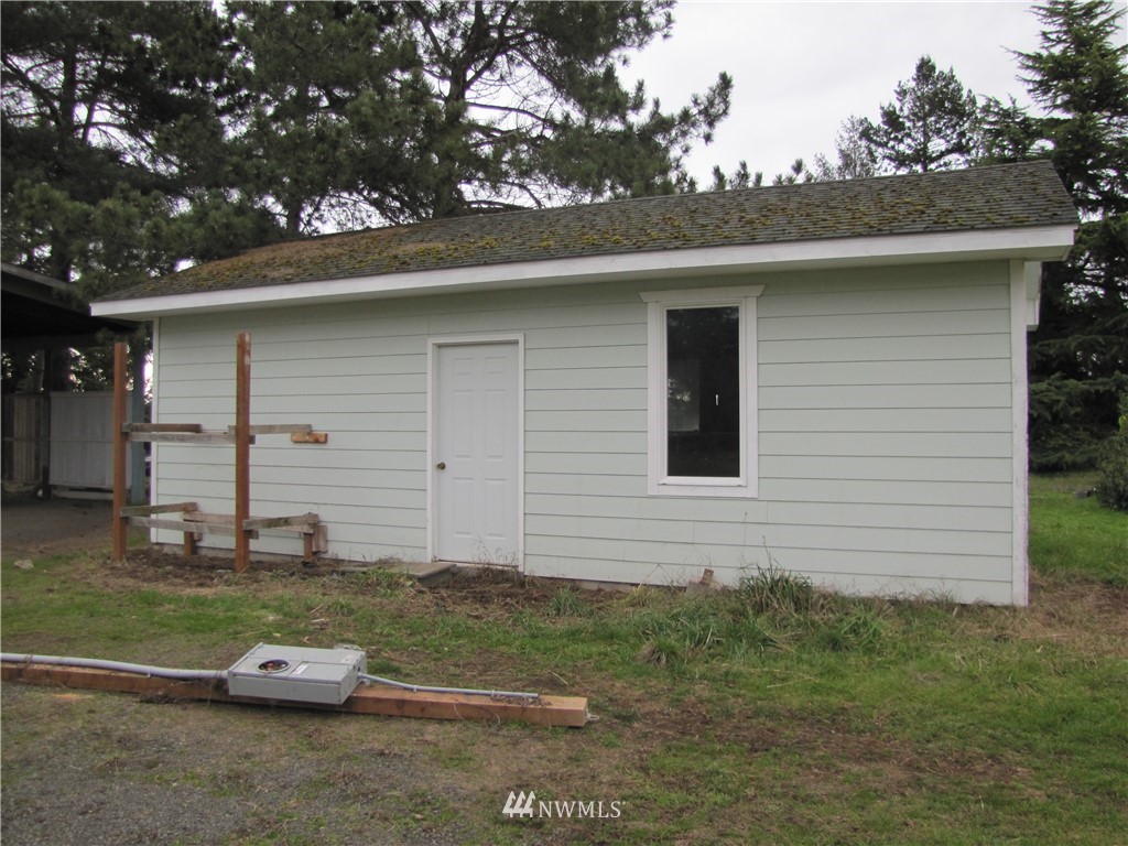 11 Stone Road Sequim, WA 98382 - Photo 6 of 21 a car parked in front of a house