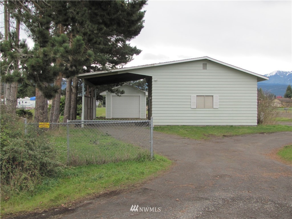 11 Stone Road Sequim, WA 98382 - Photo 7 of 21 a view of a house with a yard