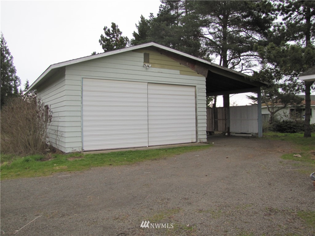 11 Stone Road Sequim, WA 98382 - Photo 9 of 21 a small white house with a outdoor space