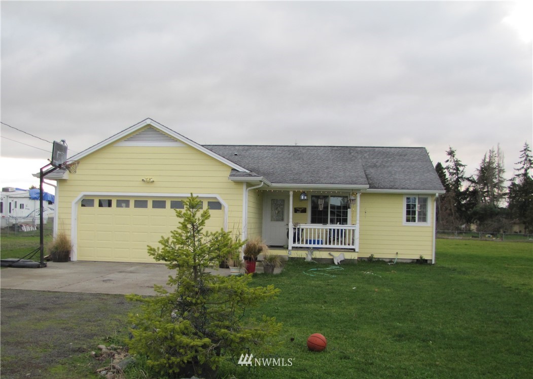 11 Stone Road Sequim, WA 98382 - Photo 10 of 21 a view of a house with a yard and a large window