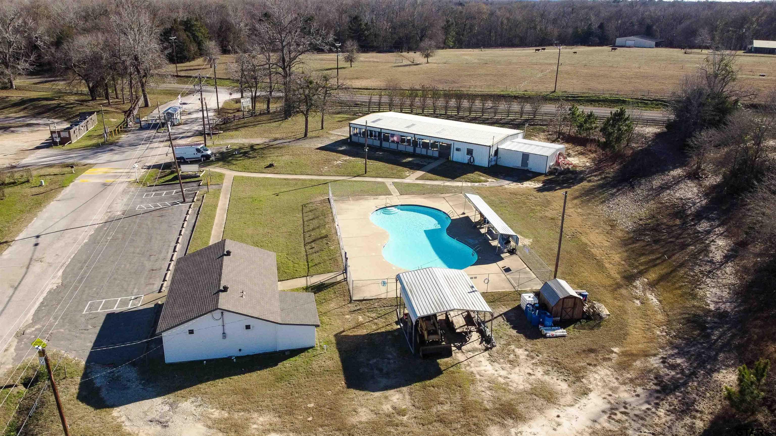 111 Ridgewood Lane Murchison, TX 75778 - Photo 40 of 42 pool, restroom and shower facility, boat ramp, pavilion with picnic tables and HOA office