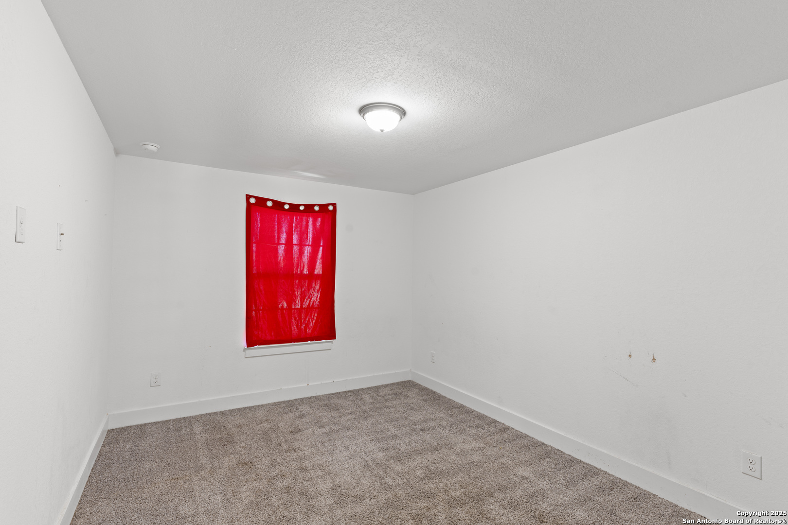 8823 Catnip Pass Elmendorf, TX 78112 - Photo 31 of 34 an empty room with windows