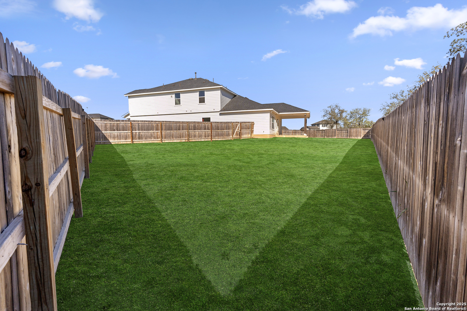 8823 Catnip Pass Elmendorf, TX 78112 - Photo 8 of 34 a view of a back yard of the house