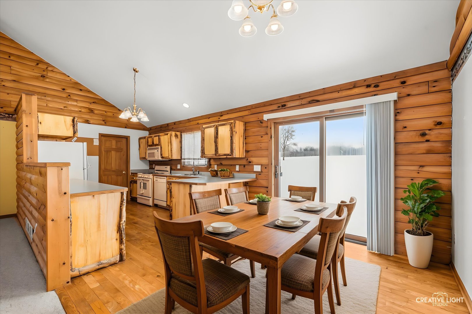 122 Belle Rive Drive Millington, IL 60537 - Photo 11 of 31 a dining room with furniture window and wooden floor