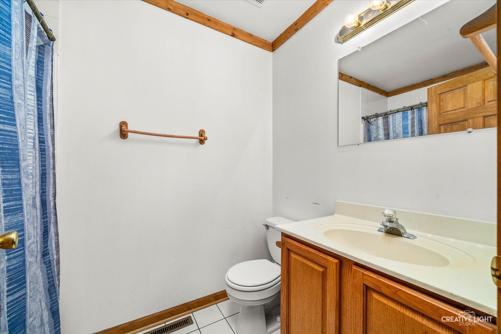 122 Belle Rive Drive Millington, IL 60537 - Photo 22 of 31 a bathroom with a sink a toilet and a mirror