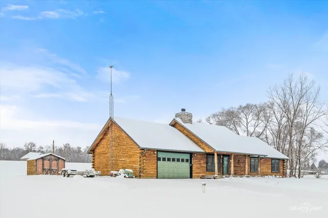 a view of a terrace with a bench and trees