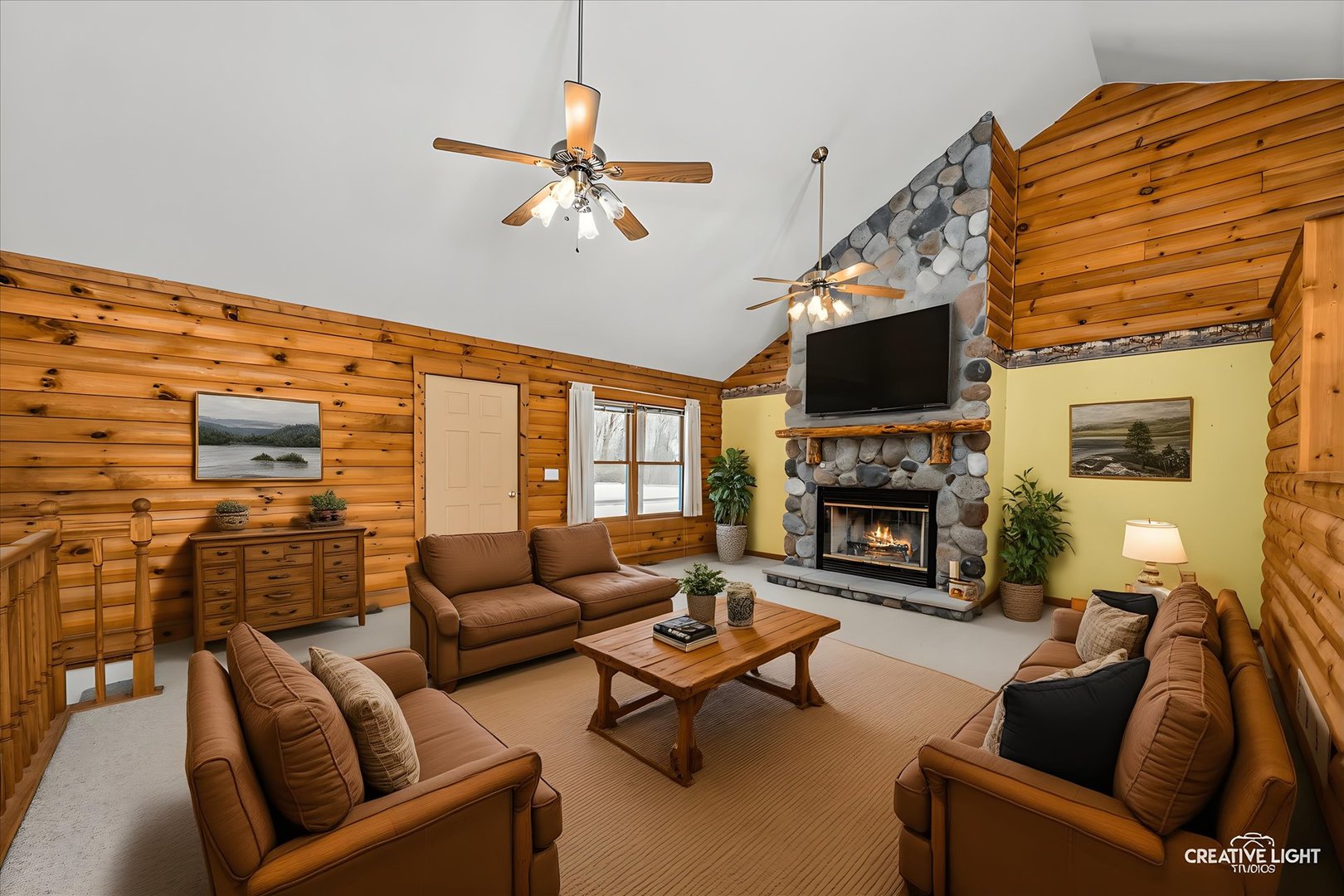 122 Belle Rive Drive Millington, IL 60537 - Photo 7 of 31 a living room with furniture a fireplace and a flat screen tv
