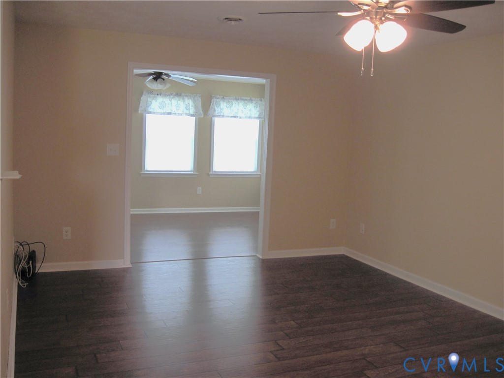 94 Sand Hill Road Toano, VA 23168 - Photo 3 of 20 Living Room into the Florida room