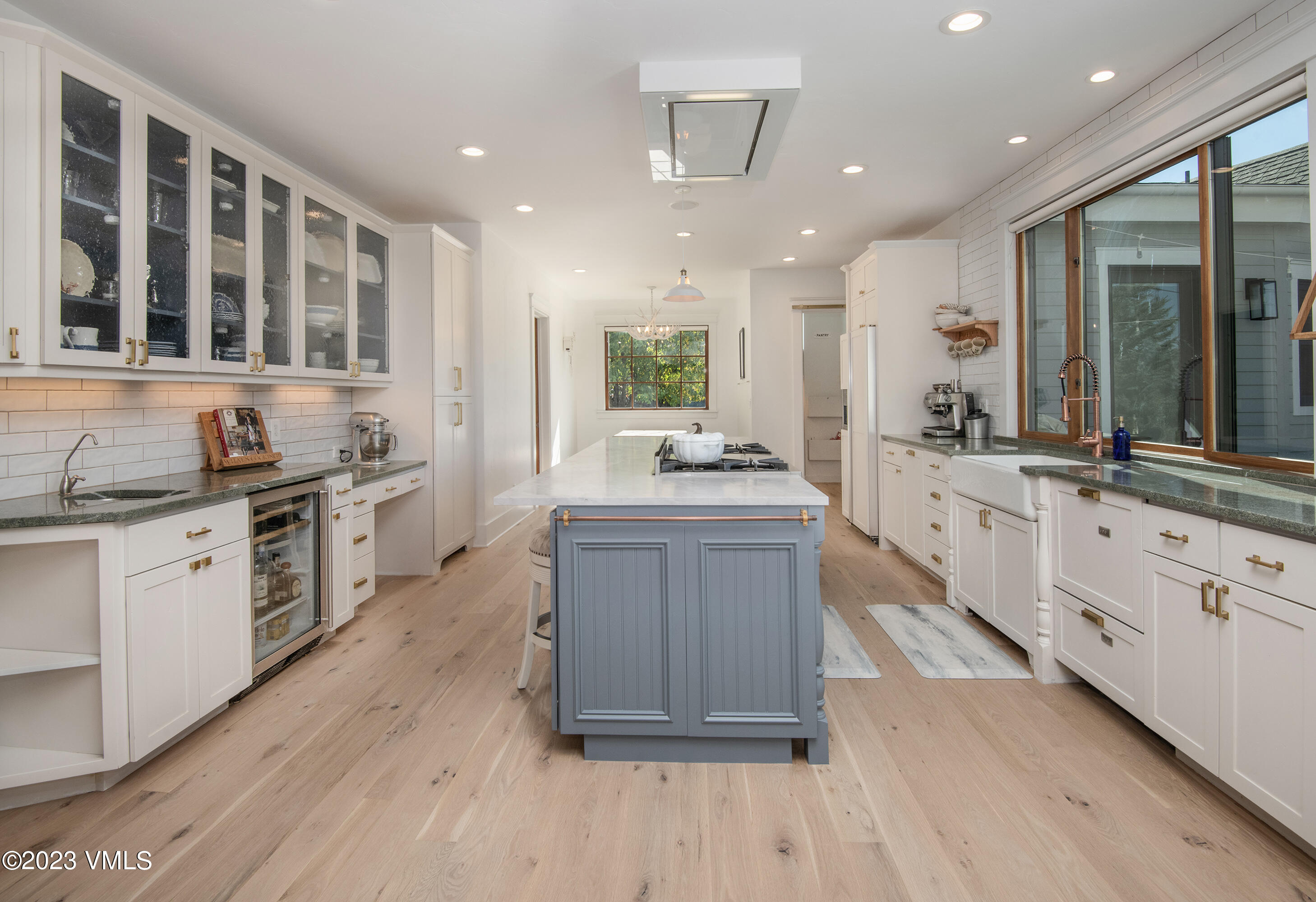 275 Robins Egg Eagle, CO 81631 - Photo 1 of 46 a large kitchen with stainless steel appliances a large counter top a stove a sink and a refrigerator