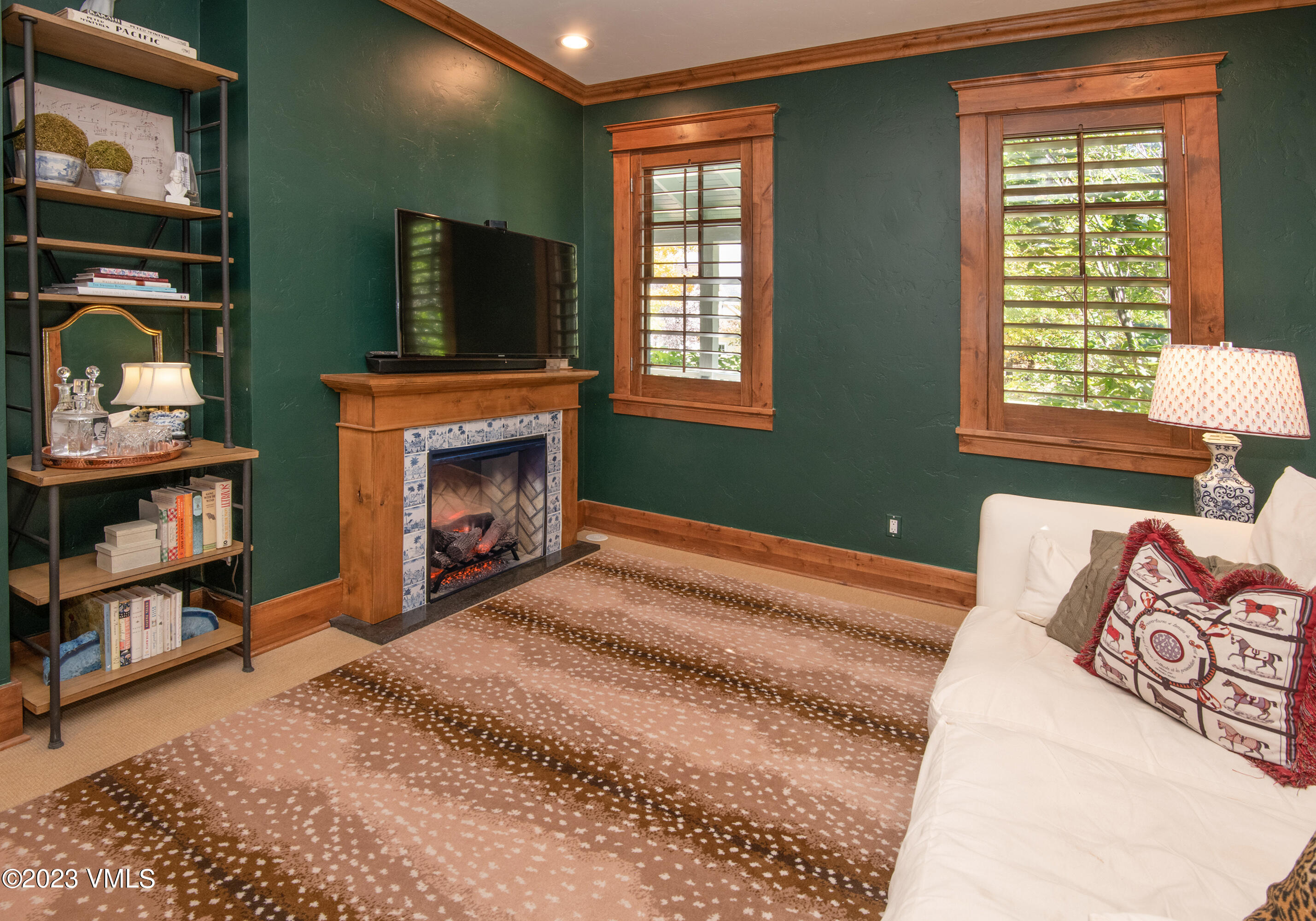 275 Robins Egg Eagle, CO 81631 - Photo 12 of 46 a bedroom with furniture and a fireplace