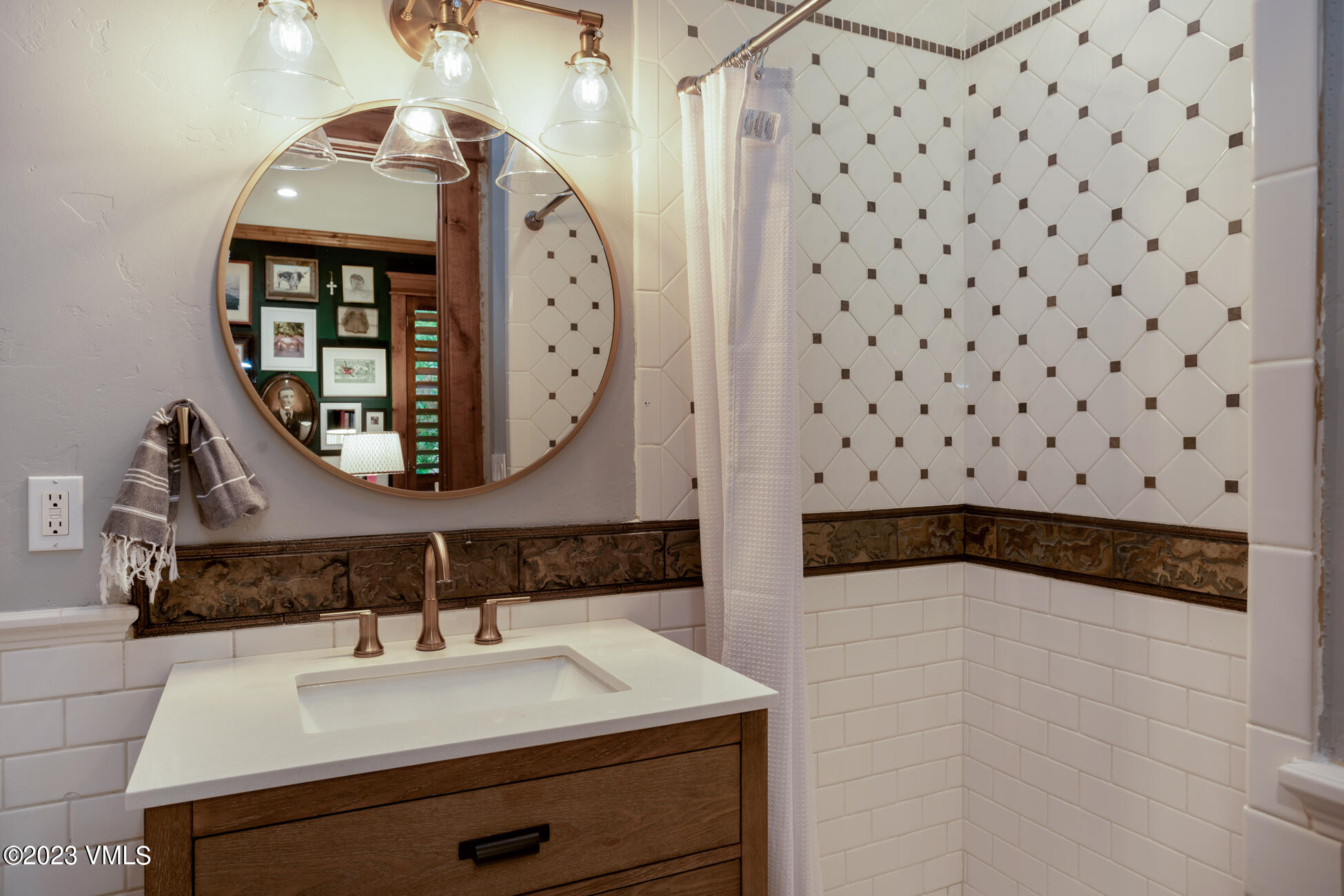 275 Robins Egg Eagle, CO 81631 - Photo 13 of 46 a bathroom with a sink a mirror and a shower