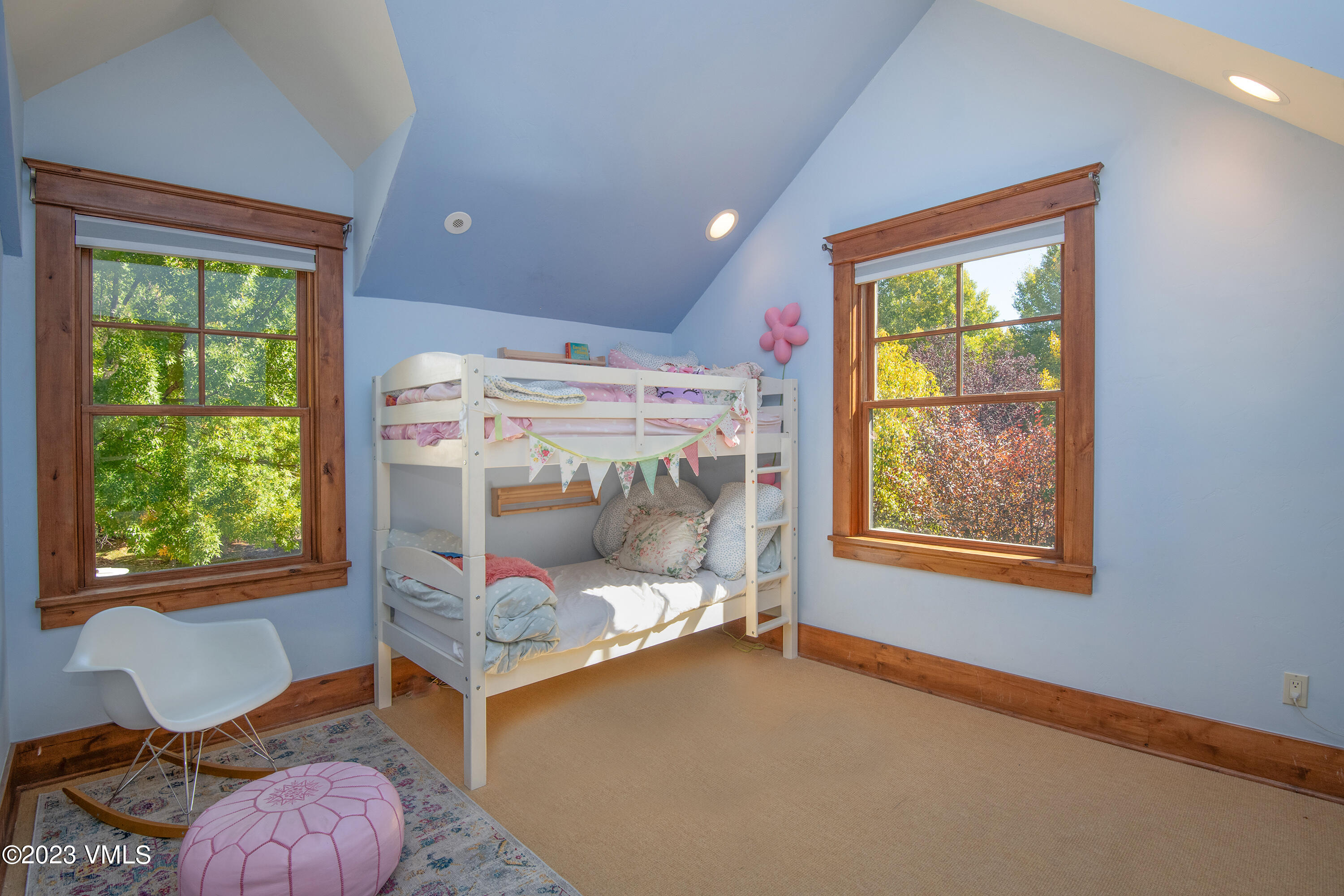 275 Robins Egg Eagle, CO 81631 - Photo 16 of 46 a bedroom with a bed and a window