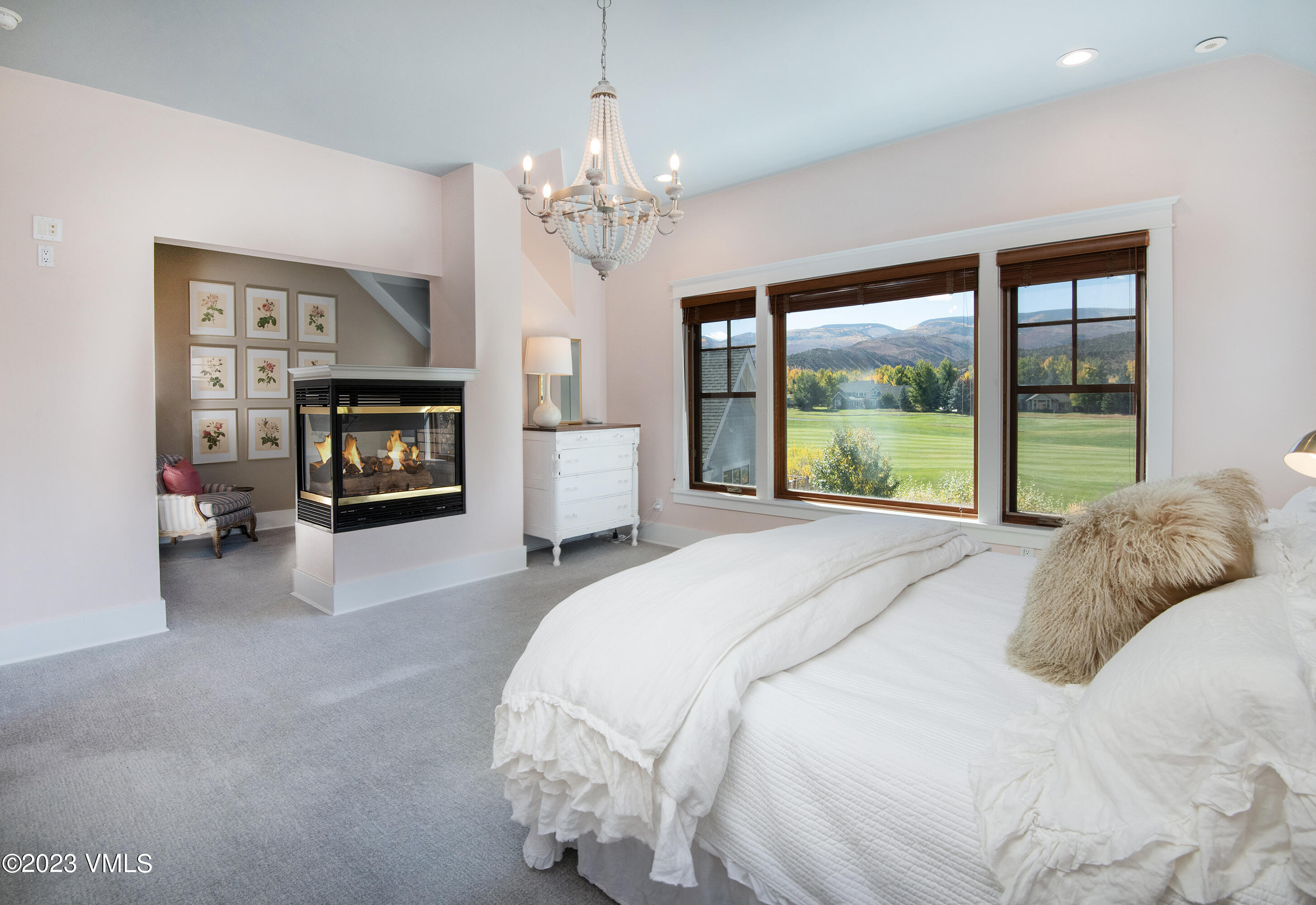 275 Robins Egg Eagle, CO 81631 - Photo 18 of 46 a bedroom with a bed and a fireplace